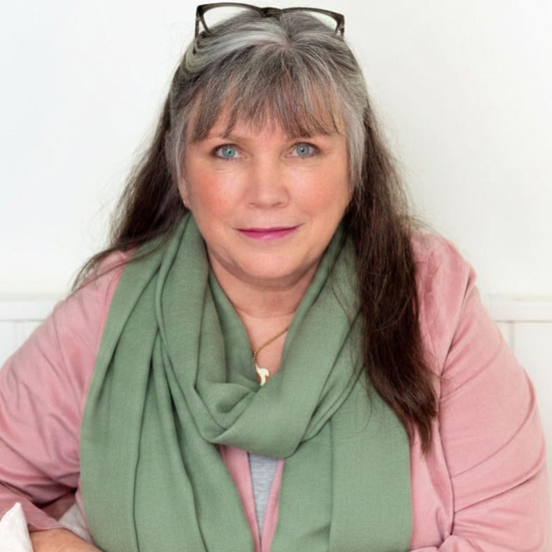 Kathleen wearing a Sage mild green scarf
